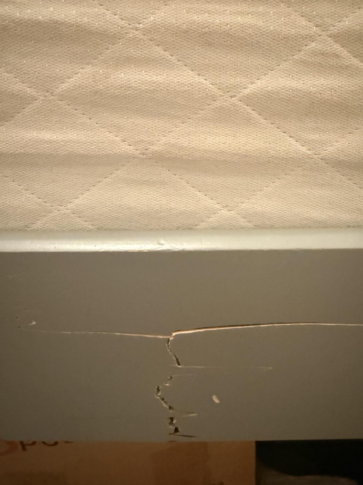 Cracked particle board