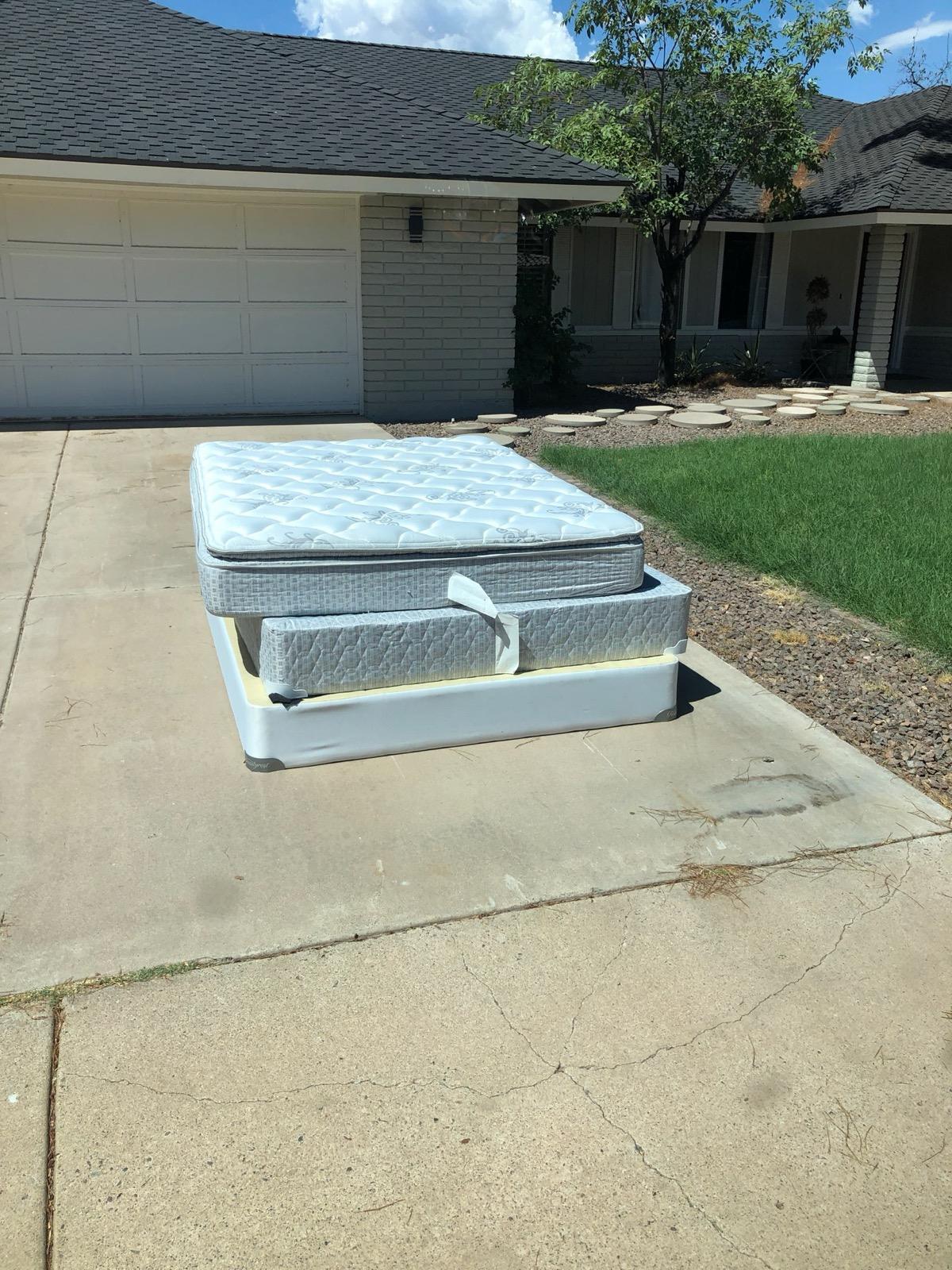 Mattress pickup from a driveway