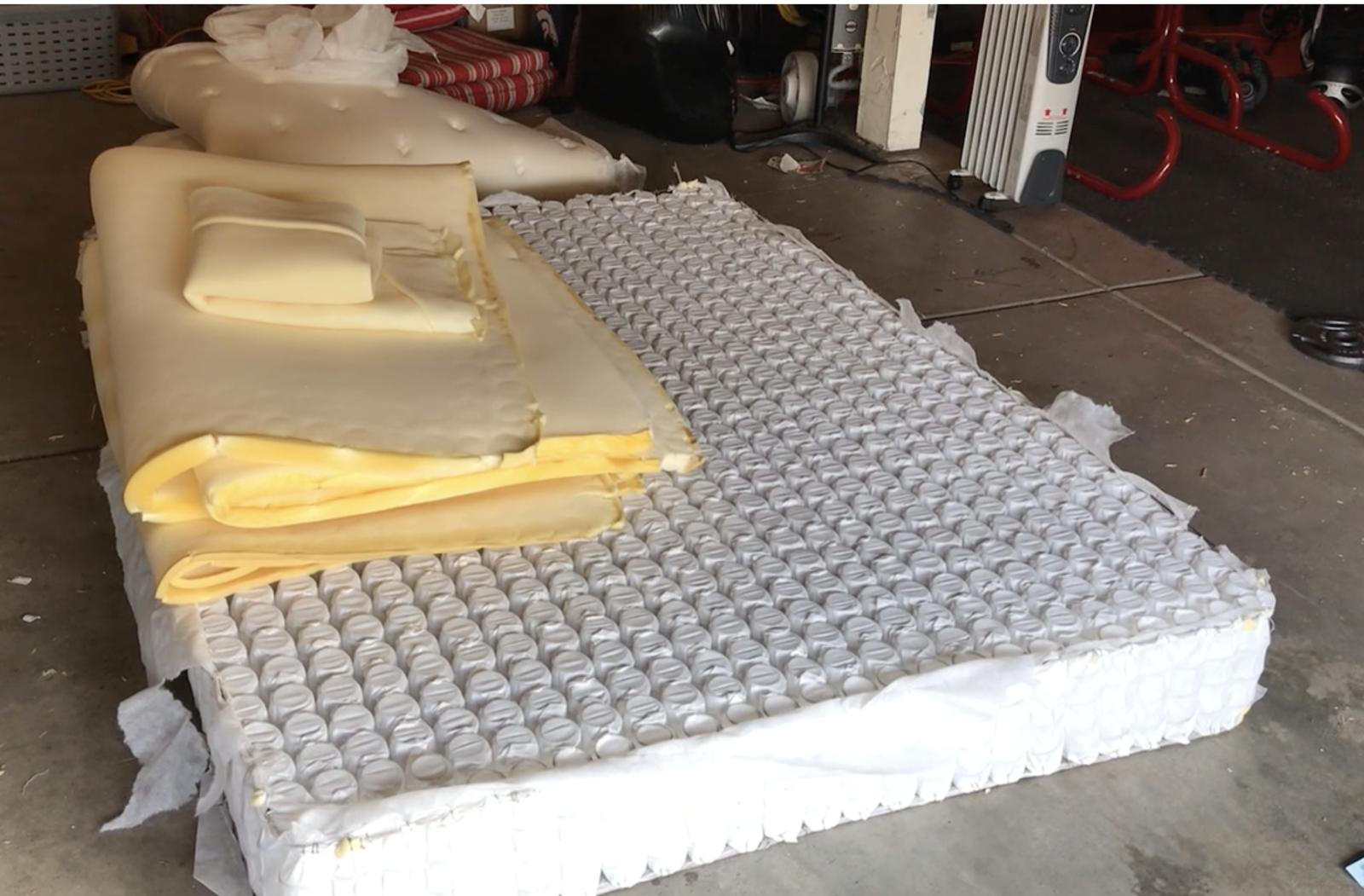 Multiple mattress layers exposed during recycling