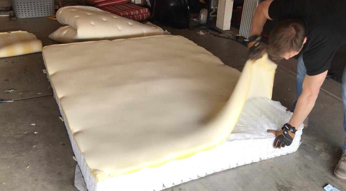 Tearing open an old mattress